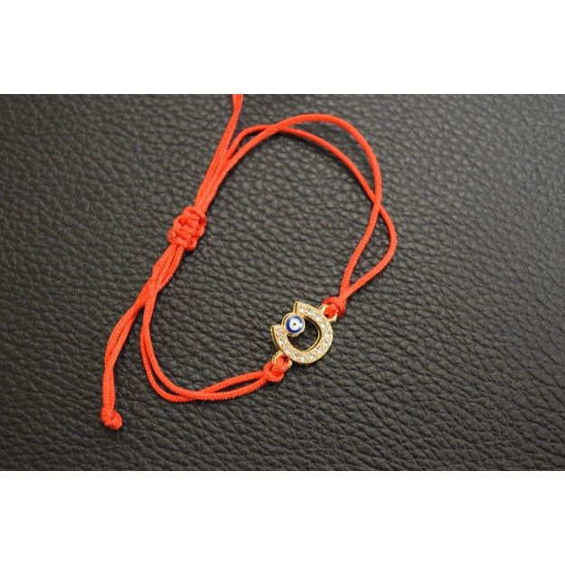 Raudonas (juodas) siūlas ant riešo su pasaga ir Fatimos akimi.